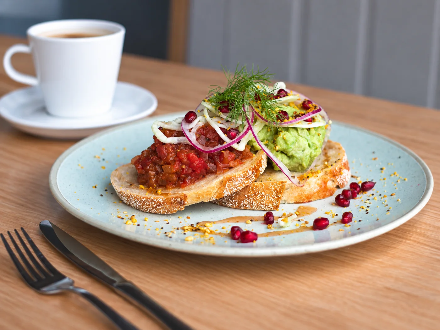 Avocado and tomato served on toast